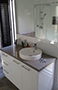 Thumbnail of Round above bench vanity basin with pivot door shower and Twin Shower Rail